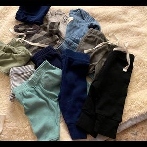 Carters/Gerber 16 piece Newborn clothing lot. Worn once or never worn